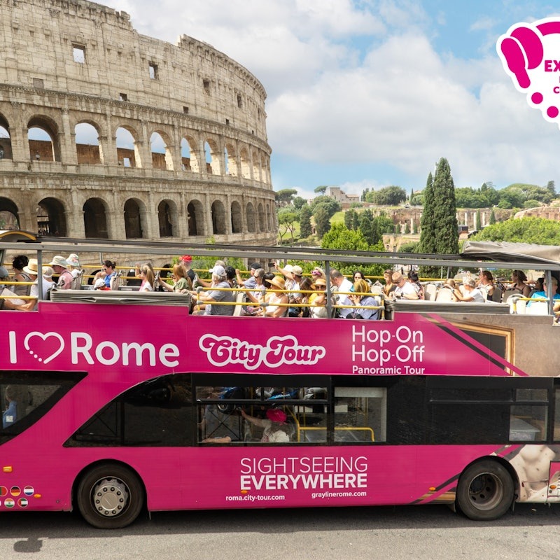 Tourist bus in Rome in front of the Colosseum